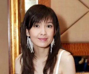 周慧敏老公(周慧敏选择嫁给花心男倪震)